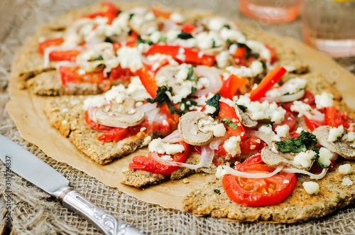 buckwheat Chia seed pizza crust with mushrooms, tomato, Basil and cheese