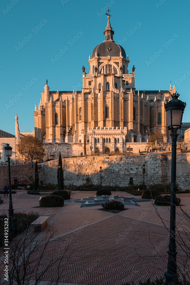 Obraz premium The Almudena Cathedral in Madrid, Spain. Sunset time of the day