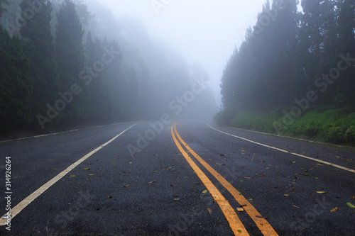 Country road with foggy at Thailand