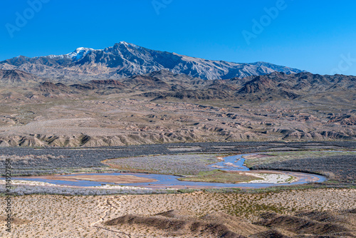 USA, Nevada, Clark County, Gold Butte National Monument. A double bend of the Virgin River below Virgin Peak. As seen from Double Negative on Mormon Mesa.