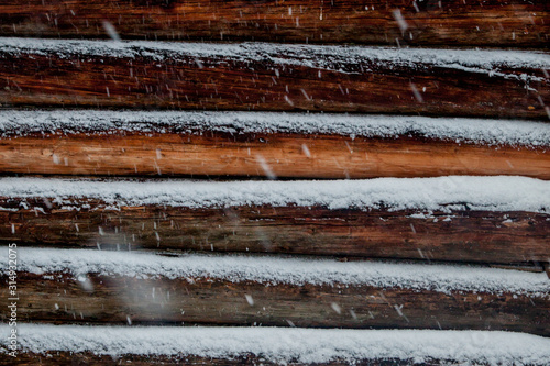 closeup background of old wood planks under snow