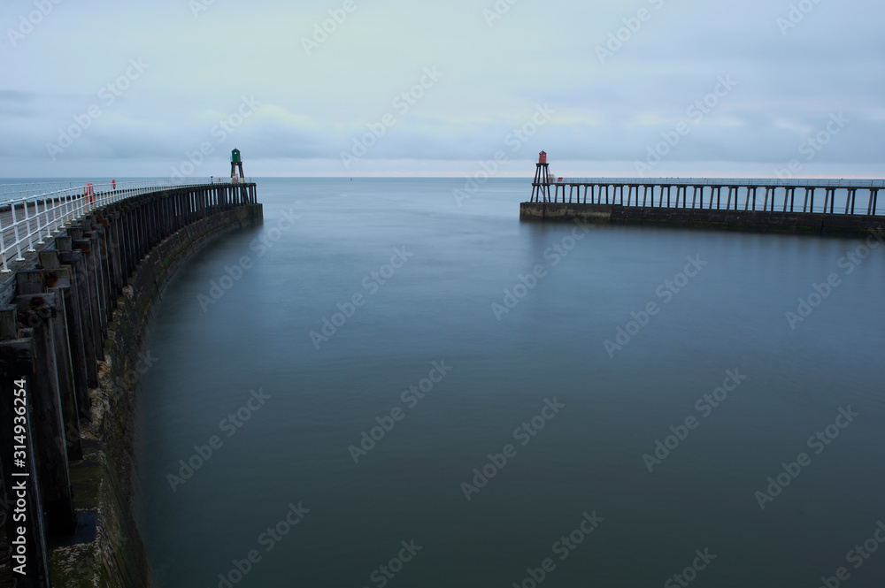 Fototapeta premium Whitby East and West Piers