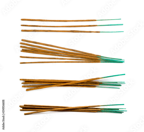 Brown indian incense aroma sticks isolated on white background