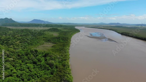 Aerial shot of river Tempisque and Palo Verde National Park, shot at Puente de La Amistad de Taiwán (Taiwan friendship bridge). Guanacaste, Costa Rica. photo
