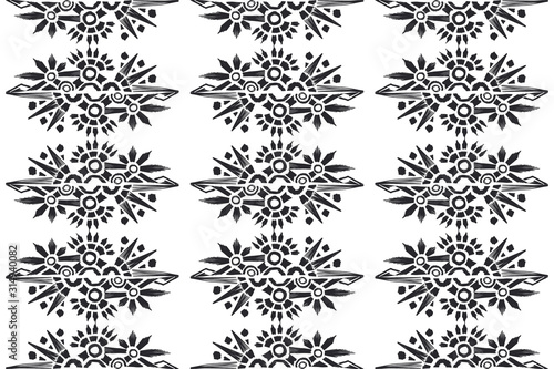 Ikat pattern etnic indian ornamental black and white illustration. Navajo motif texture ornate  design for surface print. Black and white background.