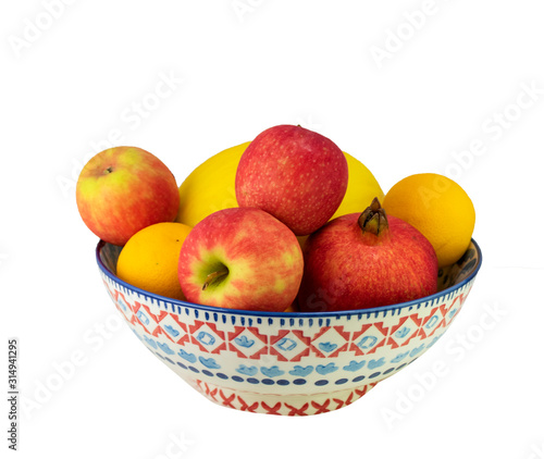 Apples in a bowl isolated on white background