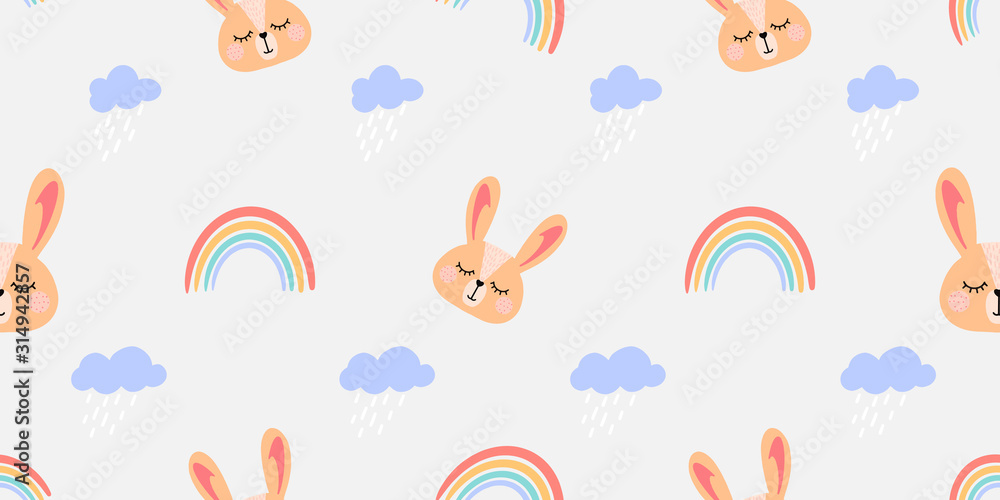 Vector pattern with colorful rainbows, clouds , rabbit and other elements. Seamless texture for baby clothes, bed linen, wrapping paper