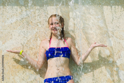 Teenage girl playing with w...