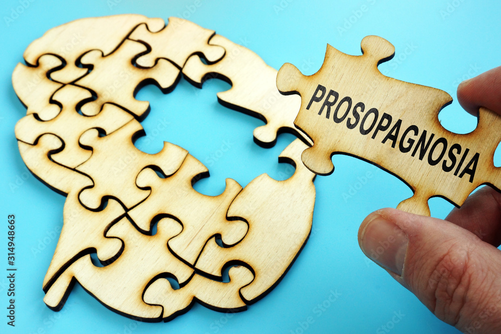 Prosopagnosia written on the piece of puzzle. Prosopagnosia written on the piece of puzzle.