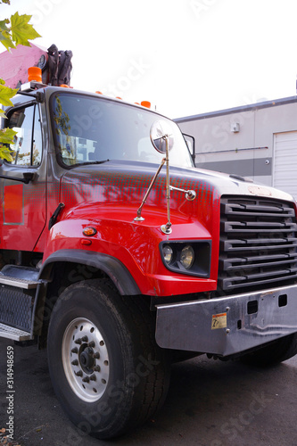 Boom truck (rush crane truck) on parking. Transportation in America.