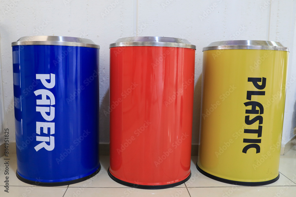 Yellow, Red and Blue recycle bins. Interior recycling bins. Yellow, Red and Blue recycle bins. Interior recycling bins.