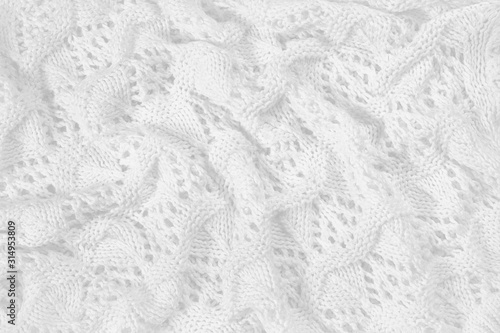 Abstract vintage white background, knitted homemade delicate lace of crochet napkins in retro style, closeup