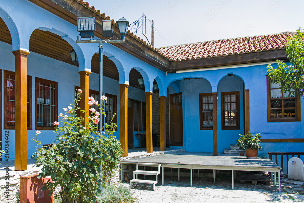 Typical street and houses at old town of city of Kavala, Greece