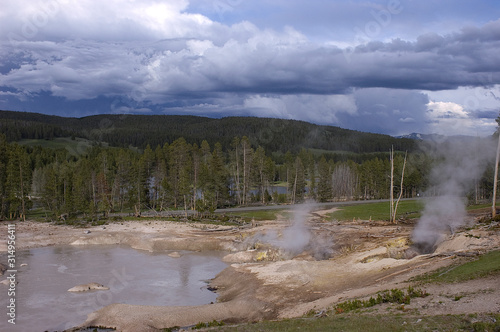 steam rising from sulfur pots