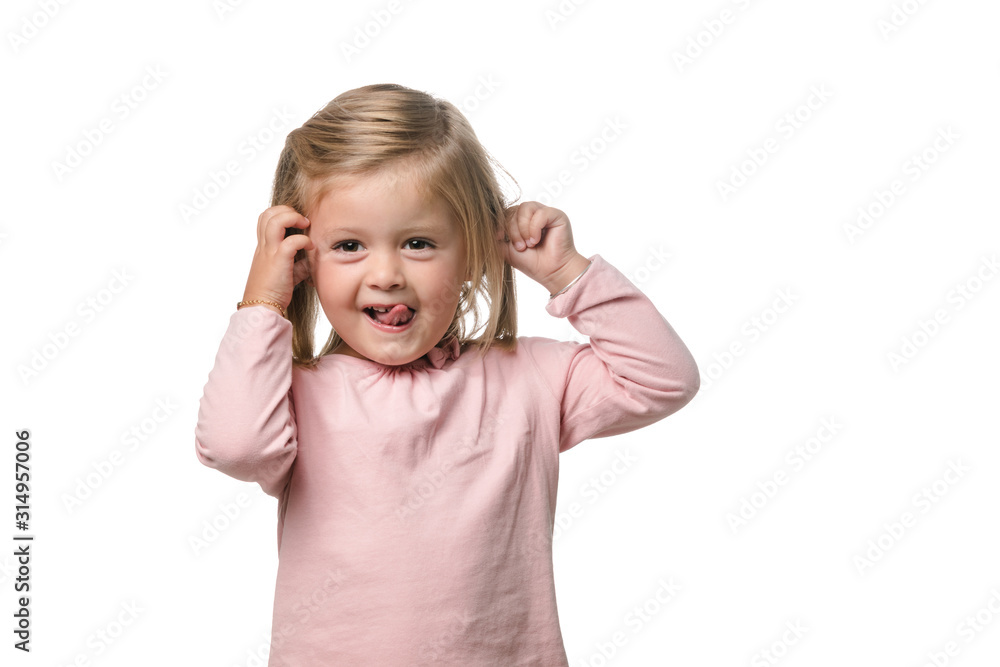 Funny little girl showing the tongue to the camera on white background Funny little girl showing the tongue to the camera on white background