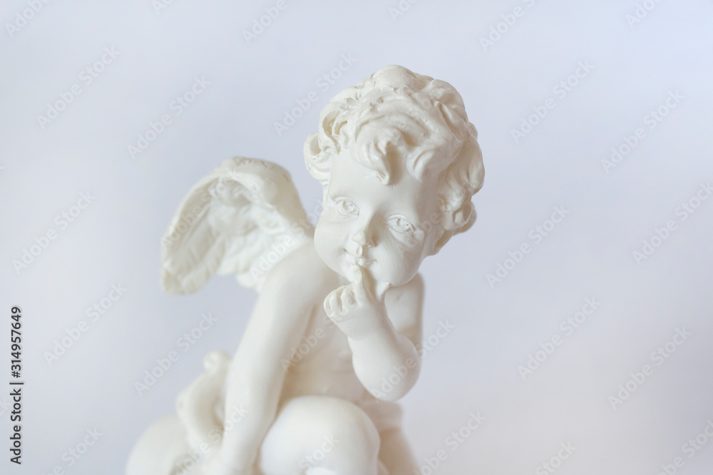 beautiful little angel boy on white background love romance concept