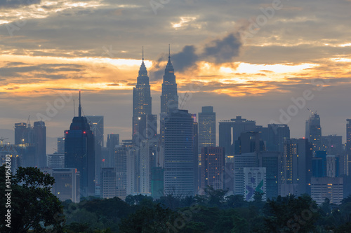 kuala lumpur city skyline during sunrise