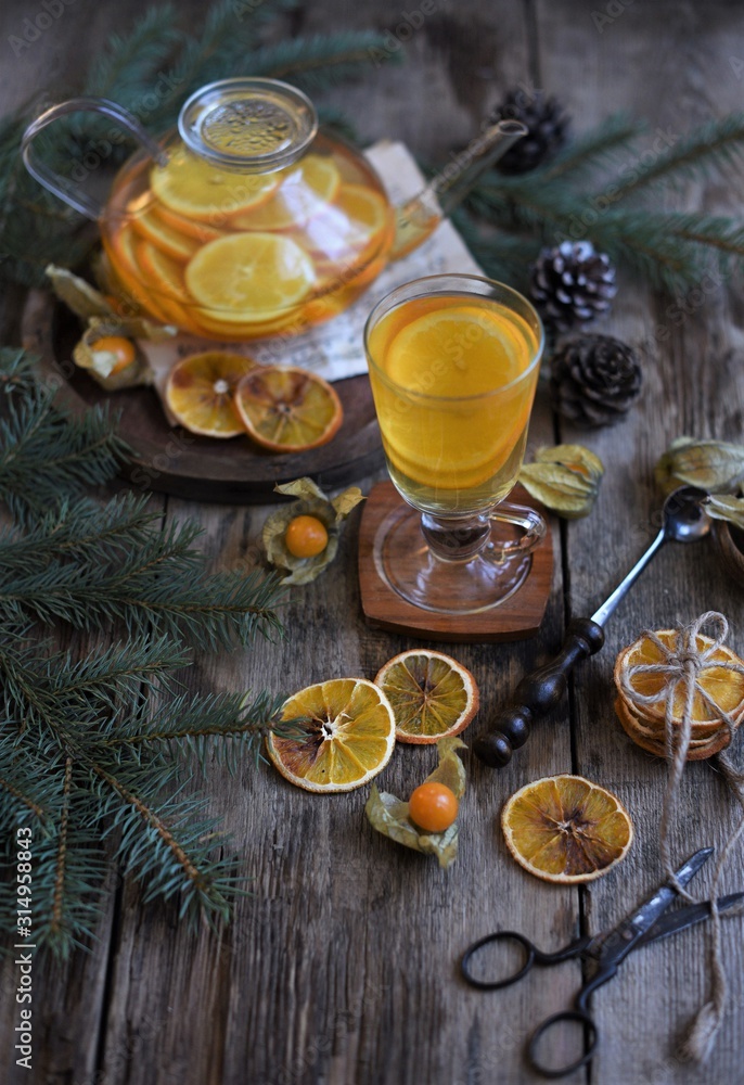 Winter tea with fresh orange . Cup of orange tea. Oriental tea. orange tea. Winter tea with fresh orange . Cup of orange tea. Oriental tea. orange tea.