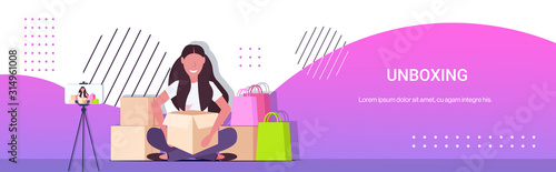woman blogger opening parcel boxes recording unboxing video live streaming social media mail delivery shipment blogging concept full length horizontal copy space vector illustration