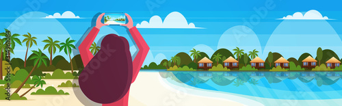 travel blogger using smartphone camera woman on tropical sea beach taking photo or video blogging live streaming summer vacation concept seascape background horizontal portrait vector illustration