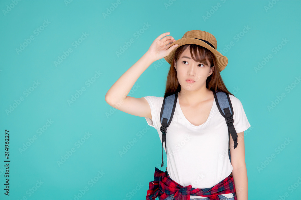 Fototapeta premium Beautiful young asian woman upset and worry travel summer trip in abroad isolated on blue background, tourist asia girl having problem and stress journey in vacation for leisure, holiday concept.