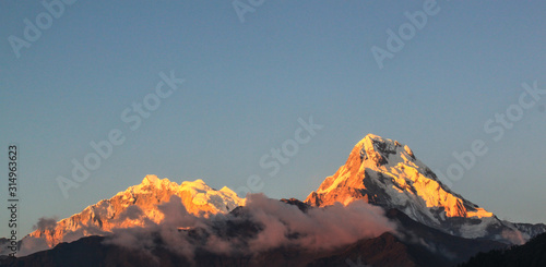 Mountains and White Fog over the Lakes at Sunrise