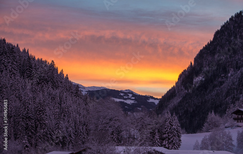 Valley Austria alpes sunset red sky dramatic clouds blue hour
