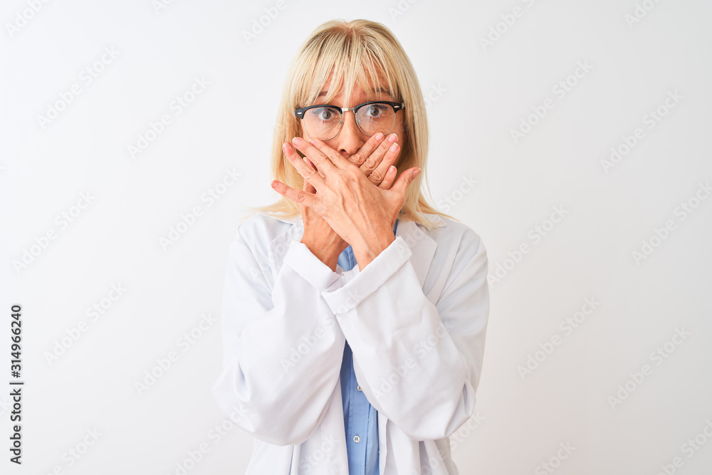Middle age scientist woman wearing glasses standing over isolated white background shocked covering mouth with hands for mistake. Secret concept. Middle age scientist woman wearing glasses standing over isolated white background shocked covering mouth with hands for mistake. Secret concept.