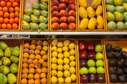 Traditional Mexican fruit display in colorful street market 