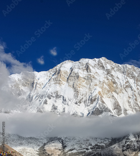 Snow-covered Mountain With Blue Sky, Cloud and Fog