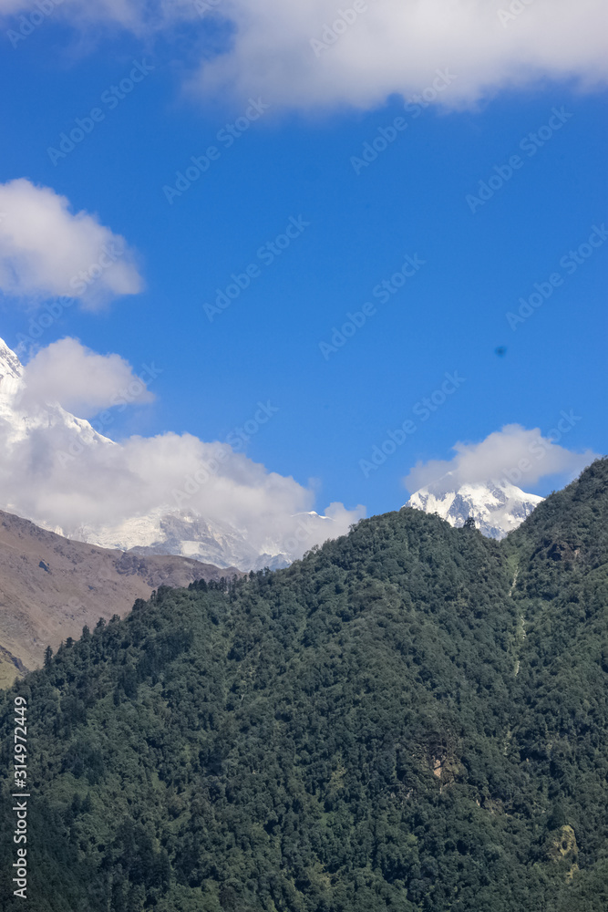 Snow-covered Mountain With Blue Sky, Cloud and Fog