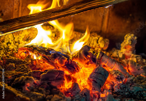 Burning wood in the fireplace