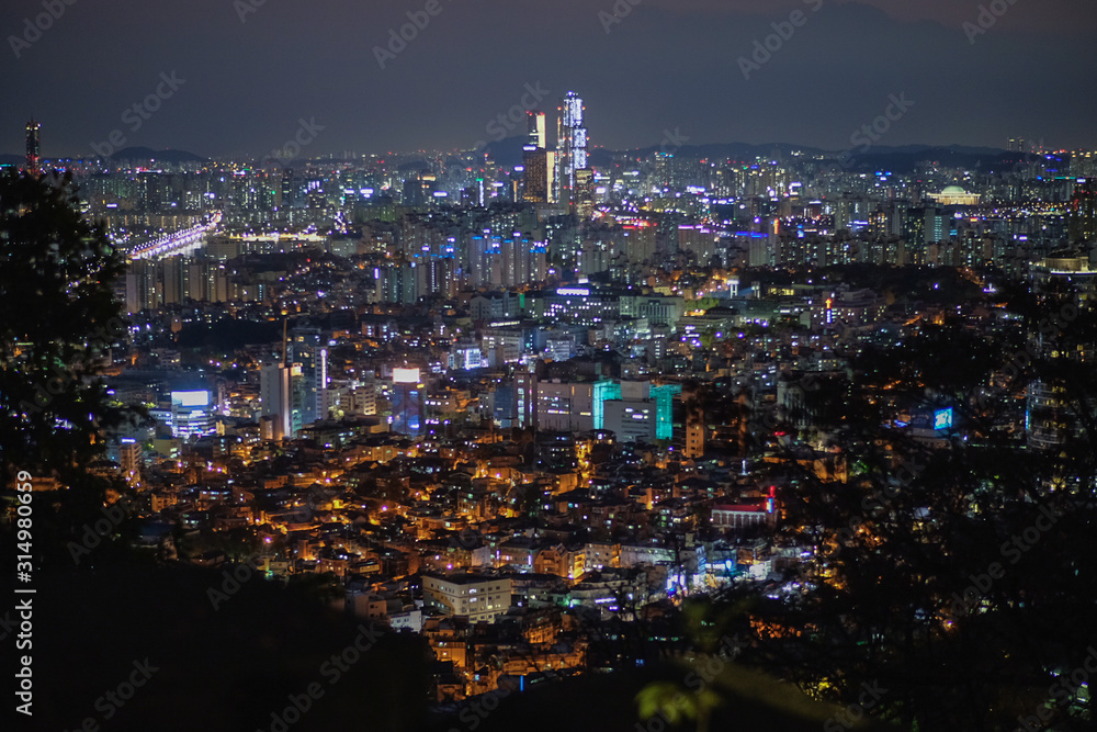 Seoul cityscape view by night from the moutain