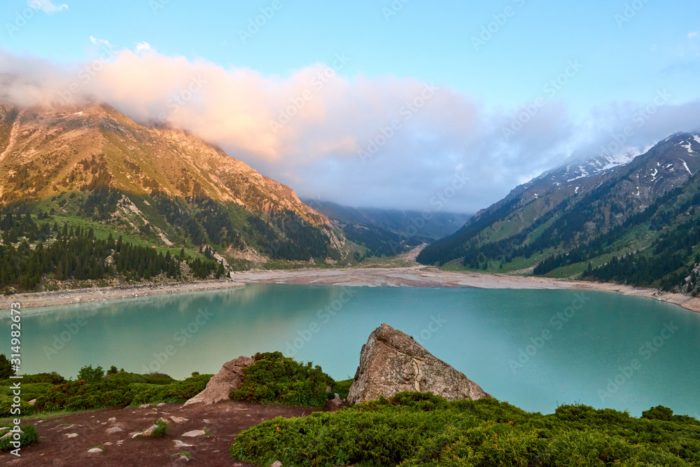 Big Almaty lake in the mountains.  Blurred water effect.  Ile-Alatau National Park.  Kazakhstan.