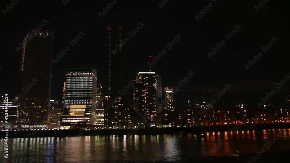 Canary Warf at night. 4K Time-lapse from the river bank. Canary Warf at night. 4K Time-lapse from the river bank.