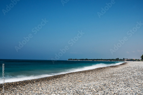 Fototapeta Naklejka Na Ścianę i Meble -  Ocean beach on the Crete long explosure