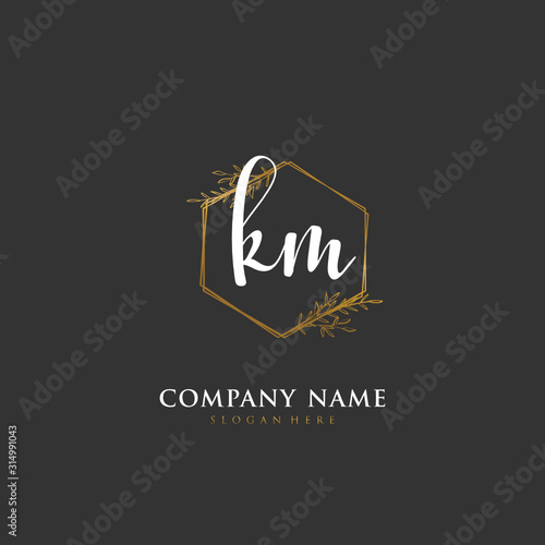 Handwritten initial letter K M KM for identity and logo. Vector logo template with handwriting and signature style.