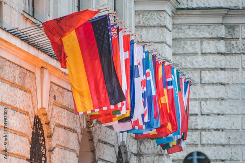 view of countries flags in on raw european photo