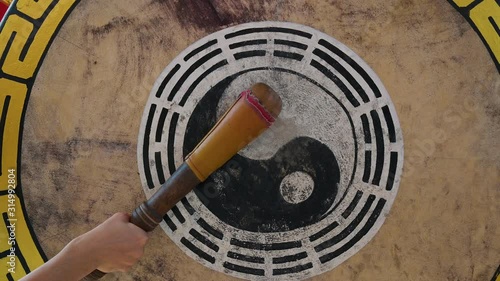 Hand playing traditional drum at china temple with 4K resolution. Asian style concept.