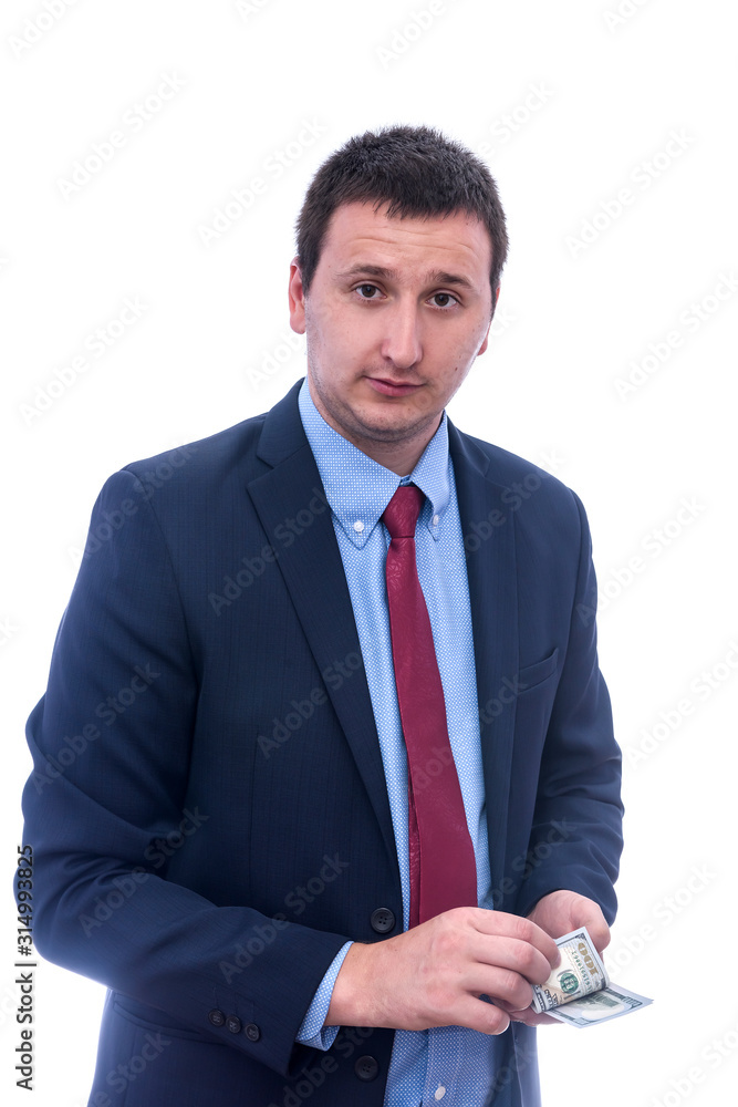 Businessman in suit holding dollar bundle in hands isolated on white Businessman in suit holding dollar bundle in hands isolated on white