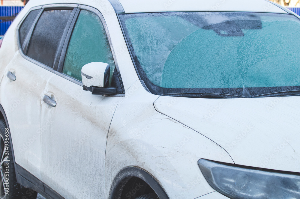 dirty frozen white car, close-up, layout for design