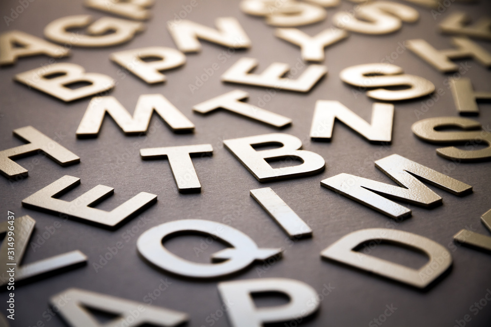 Mixed letters pile closeup photo Mixed letters pile closeup photo