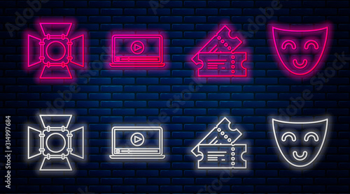 Set line Online play video , Cinema ticket , Movie spotlight and Comedy theatrical mask . Glowing neon icon on brick wall. Vector