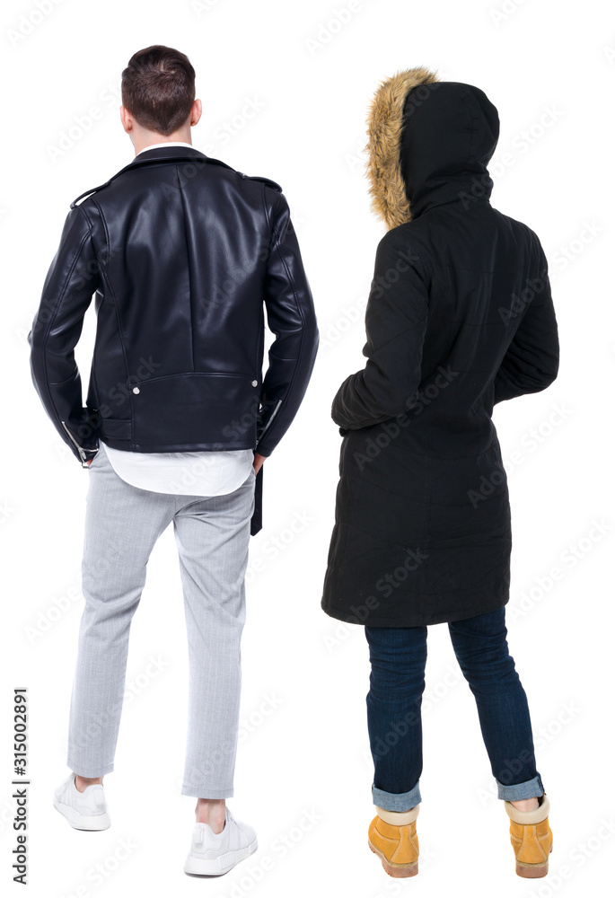 Back view of couple in winter jacket. Back view of couple in winter jacket.