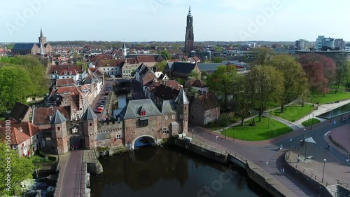 Aerial bird view footage of The Koppelpoort is a medieval gate in the Dutch city of Amersfoort province of Utrecht the construction was built between 1380 and 1425 as part of the second town wall 4k photo