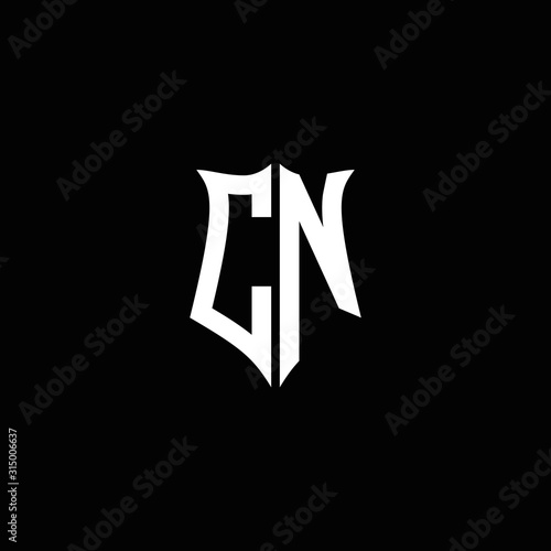 CN monogram letter logo ribbon with shield style isolated on black background