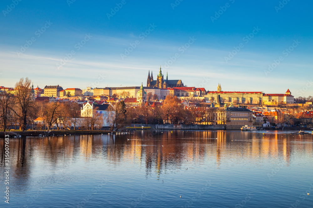 Prague Castle above Vltava river at sunset, Czech Republic, Europe.