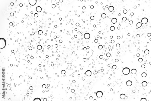 Rain drops on window glasses surface Natural Pattern of raindrops. Natural pattern of raindrops on white background for your design.