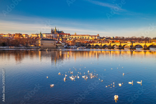 Photography Prague Castle and Charles bridge above Vltava river at sunset, Czech Republic, Europe