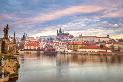 Prague Castle and Charles bridge above Vltava river early morning with beautiful sky  Czech Republic  Europe.